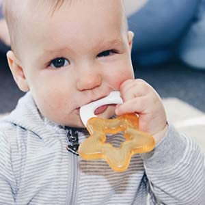 DENTISTAR® Cooling Teether in a Set of 2 – Cooling Biting Star Filled with Water - Teething aid for Babies from 3 Months - Made in Germany - Yellow - Image 2